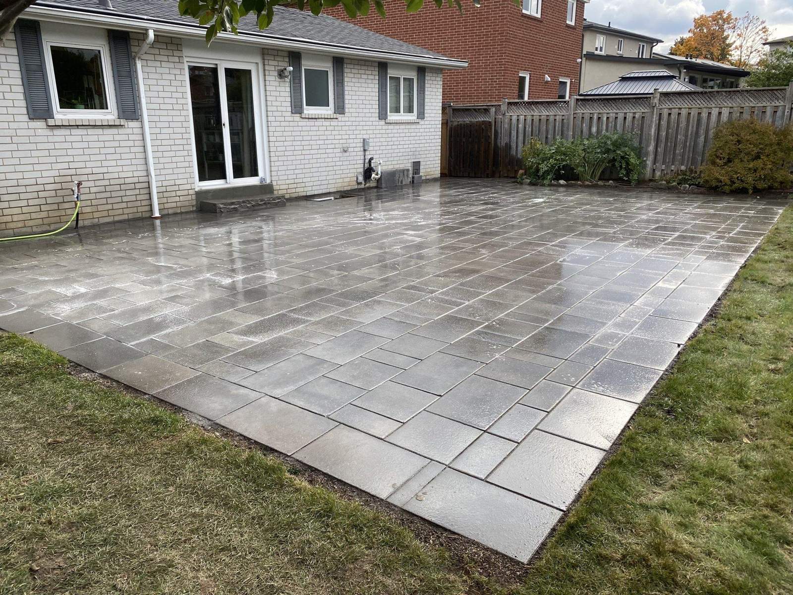 Interlocking stone patio installation